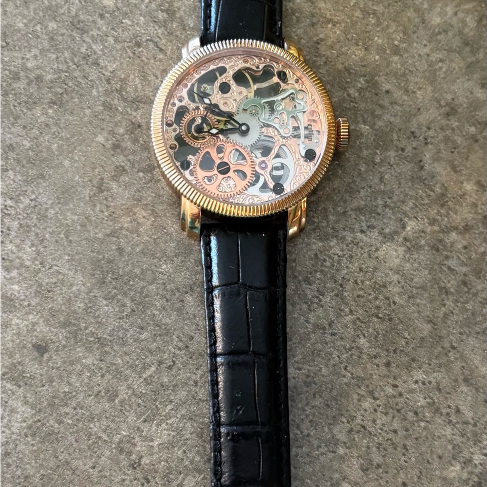 Akribos XXIV Gold and Black Skeleton Watch